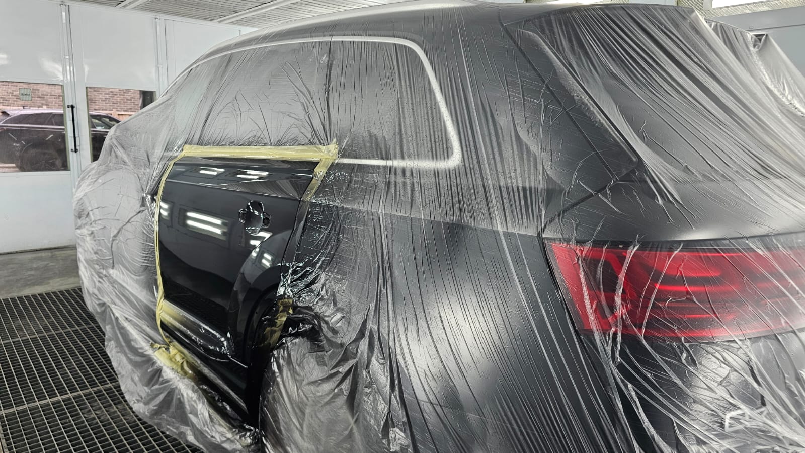 Audi Q7 rear door after paint application in the Autophix booth