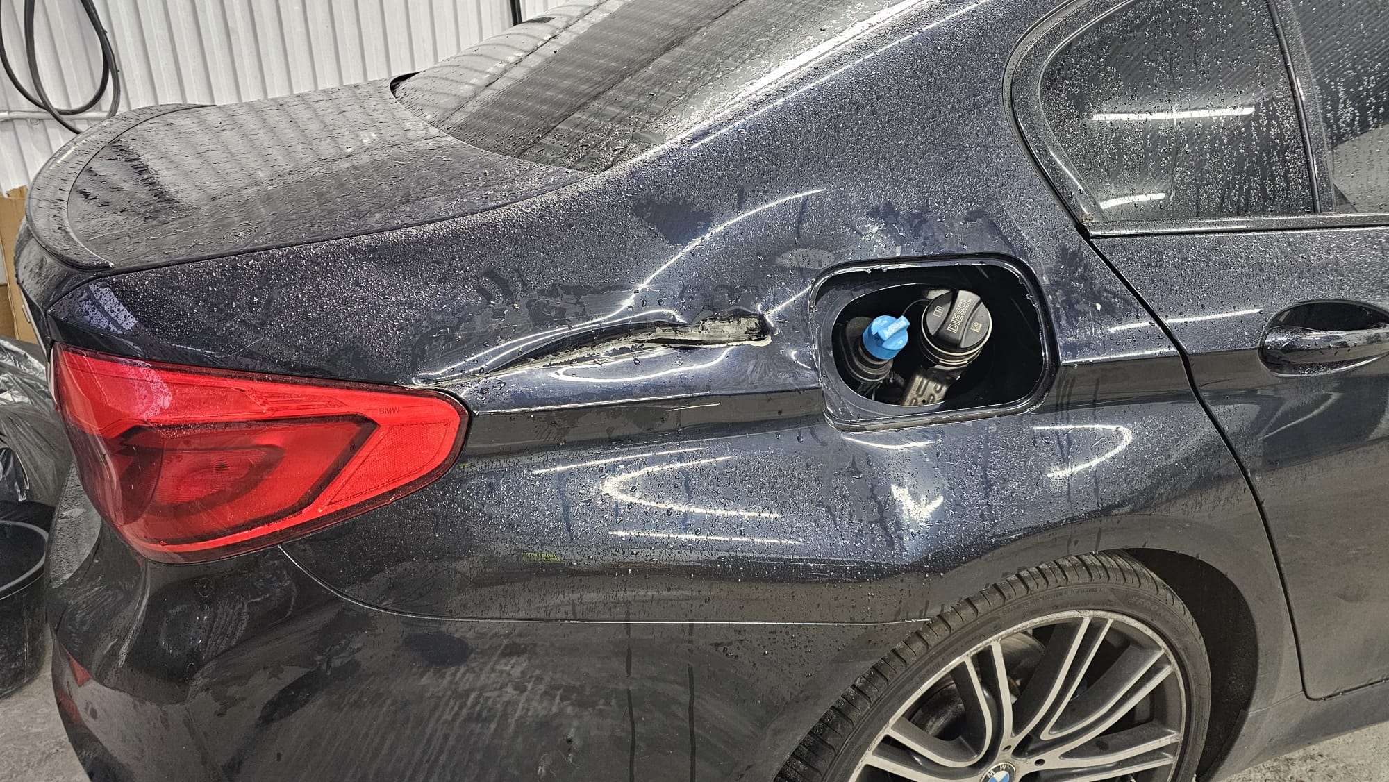 Vehicle damage documented before repair at Autophix